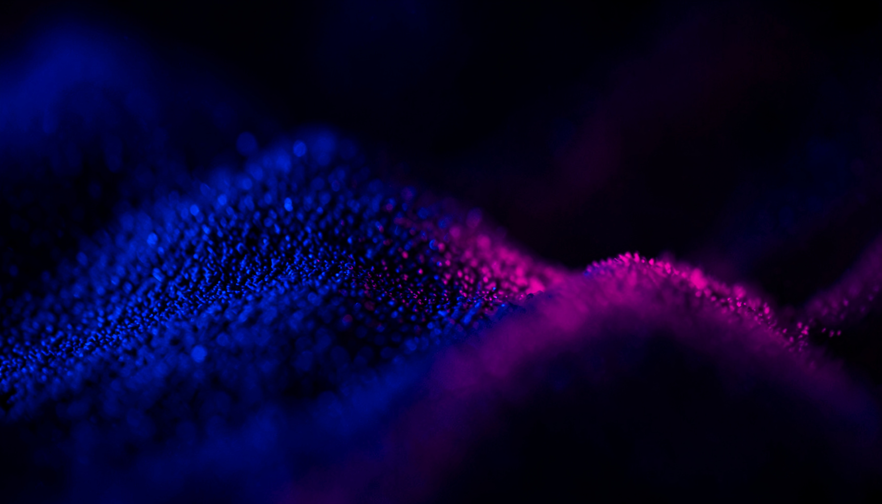 Dark navy background with vibrant magenta and electric blue gradient glow, high-energy abstract atmosphere